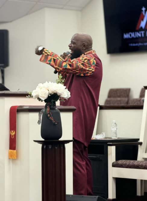 Pastor Montgomery preaching