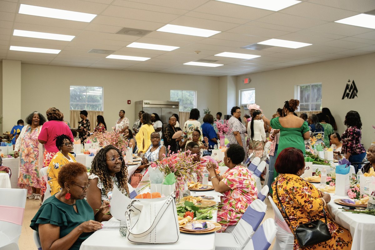 Women of the Word gathered for fellowship in the hall